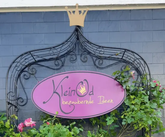 Ladenschild von Kleinod mir Rose